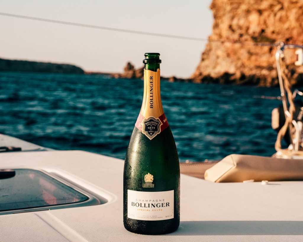 bollinger wine bottle on boat 3461205 - Simple Wedding Planning Checklist for the Practical Bride - The National Wedding Directory