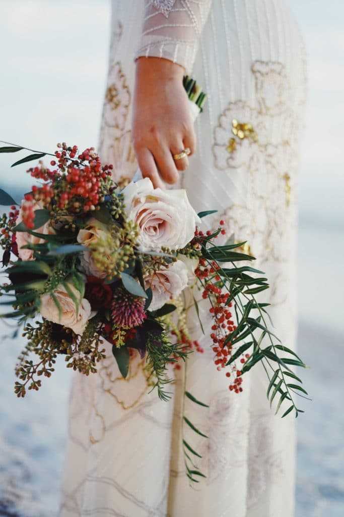 woman holding bouquet of flowers 712651 - Simple Wedding Planning Checklist for the Practical Bride - The National Wedding Directory