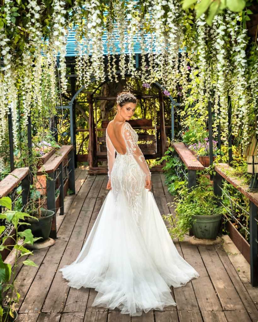 woman in white wedding gown standing on brown wooden pathway 3739003 - Simple Wedding Planning Checklist for the Practical Bride - The National Wedding Directory